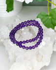 AMETHYST 6mm - HANDMADE CRYSTAL BRACELET - 6mm, air, amethyst, aquarius, aries, august 2025 restock, bracelet, crystal bracelet, crystals for beginners, emotional support, handmade bracelet, jewelry, libra, market bracelet, mercury retrograde, pisces, purple, restocked, sagittarius, scorpio, spring things, storm, virgo, water, Wearable - The Mineral Maven