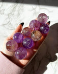 AMETRINE SPHERE - amethyst, ametrine, Black Friday sale, citrine, crystals for beginners, emotional support, february, focus gift bundle, grief gift bundle, mini sphere, polished, polished stone, sphere, spring things, winter solstice - The Mineral Maven
