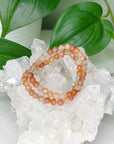 ARUSHA SUNSTONE 6mm - HANDMADE CRYSTAL BRACELET - 6mm, Arusha sunstone, bracelet, career, crystal bracelet, fire, handmade bracelet, jewelry, Leo, libra, orange, summer solstice, summerween collection, sunstone, Tanzanian sunstone, Wearable - The Mineral Maven
