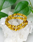 BLONDE TIGER’S EYE 8mm - HANDMADE CRYSTAL BRACELET - 8mm, blonde tigers eye, bracelet, capricorn, career, crystal bracelet, crystals for beginners, earth, fire, handmade bracelet, jewelry, Leo, market bracelet, summerween collection, sun, tiger’s eye, Wearable - The Mineral Maven