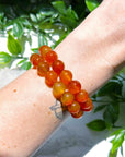 CARNELIAN 10mm - HANDMADE CRYSTAL BRACELET - 10 Dec Inventory, 10mm, april astro, aries, aries stack, bracelet, bracelet inventory check, cancer, cancer stack, career, carnelian, crystal bracelet, crystals for beginners, emotional support, fertility, fire, handmade bracelet, jewelry, June 2025 inventory check, leo, leo stack, Leo szn, market bracelet, may day/beltane, Orange, red, spring things, summer solstice, taurus, taurus stack, virgo, virgo stack, Wearable - The Mineral Maven
