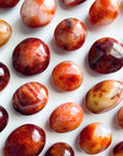 CARNELIAN PALM STONE - Black Friday sale, career, carnelian, crystals for beginners, emotional support, fertility, gallet, leo season, Leo szn, palm, palm stone, palmstone, spring equinox, spring things - The Mineral Maven