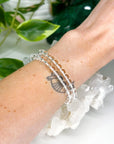 CLEAR QUARTZ 6mm - HANDMADE CRYSTAL BRACELET - 6mm, air, bracelet, cancer, clear quartz, clear/white, crystal bracelet, crystals for beginners, faceted, handmade bracelet, jewelry, June 2025 inventory check, leo, libra, market bracelet, mercury retrograde, quartz, sagittarius, storm, virgo, Wearable - The Mineral Maven