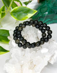 GOLD SHEEN OBSIDIAN 10mm - HANDMADE CRYSTAL BRACELET - 10 Dec Inventory, 10mm, april astro, black, bracelet, bracelet inventory check, crystal bracelet, Friday the 13th, gold sheen obsidian, handmade bracelet, jewelry, June 2025 inventory check, market bracelet, obsidian, scorpio, scorpio stack, virgo, virgo stack, Wearable - The Mineral Maven