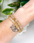 GOLDEN RUTILATED QUARTZ 6mm - HANDMADE CRYSTAL BRACELET - 10 Dec Inventory, 6mm, bracelet, bracelet inventory check, clear/white, crystal bracelet, emotional support, fall-o-ween, fall-o-ween bracelets, focus gift bundle, gemini, gemini stack, golden rutilated, golden rutilated quartz, handmade bracelet, jewelry, June 2025 inventory check, leo, leo stack, market bracelet, metallic, rutilated quartz, storm, Wearable, yellow - The Mineral Maven