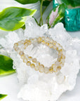 GOLDEN RUTILATED QUARTZ 6mm - HANDMADE CRYSTAL BRACELET - 10 Dec Inventory, 6mm, bracelet, bracelet inventory check, clear/white, crystal bracelet, emotional support, fall-o-ween, fall-o-ween bracelets, focus gift bundle, gemini, gemini stack, golden rutilated, golden rutilated quartz, handmade bracelet, jewelry, June 2025 inventory check, leo, leo stack, market bracelet, metallic, rutilated quartz, storm, Wearable, yellow - The Mineral Maven