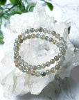 GREY MOONSTONE 6mm - HANDMADE CRYSTAL BRACELET - 6mm, air, aquarius, aquarius stack, bracelet, calm gift bundle, cancer, cancer stack, crystal bracelet, emotional support, gemini, gemini stack, grey, grey moonstone, handmade bracelet, jewelry, june wrist candy, libra, libra stack, market bracelet, may day/beltane, moonstone, new beginnings gift bundle, old stock bracelet, pisces, pisces stack, recently added, summer solstice, summer wrist candy, virgo, virgo stack, Wearable - The Mineral Maven