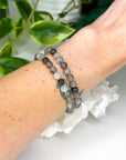 GREY RUTILATED QUARTZ 6mm - HANDMADE CRYSTAL BRACELET - 10 Dec Inventory, 6mm, bracelet, bracelet inventory check, crystal bracelet, emotional support, focus gift bundle, grey, handmade bracelet, jewelry, June 2025 inventory check, market bracelet, rutilated, rutilated quartz, rutile, Scorpio Season, Wearable - The Mineral Maven