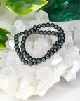 HEMATITE 6mm - HANDMADE CRYSTAL BRACELET - 6mm, Aquarius, aries, bracelet, crystal bracelet, earth, grey, handmade bracelet, hematite, jewelry, June 2025 inventory check, market bracelet, metallic, Scorpio Season, Wearable - The Mineral Maven