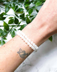 MOONSTONE 6mm - HANDMADE CRYSTAL BRACELET - 6mm, air, april astro, aquarius, aquarius stack, bracelet, cancer, cancer stack, clear/white, crystal bracelet, emotional support, fertility, gemini, gemini stack, handmade bracelet, jewelry, joy gift bundle, june wrist candy, libra, libra stack, market bracelet, may day/beltane, moonstone, new beginnings gift bundle, pisces, pisces stack, recently added, solar eclipse, summer solstice, summer wrist candy, virgo, virgo stack, Wearable - The Mineral Maven