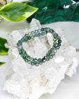 MOSS AGATE (FACETED) 6mm - HANDMADE CRYSTAL BRACELET - 10 Dec Inventory, 6mm, bracelet, bracelet inventory check, crystal bracelet, earth, emotional support, faceted, handmade bracelet, jewelry, June 2025 inventory check, market bracelet, mercury retrograde stack, moss agate, virgo, virgo stack, Wearable - The Mineral Maven