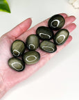 OBSIDIAN POCKET PEBBLE - Black Friday sale, black obsidian, emotional support, end of year sale, Friday the 13th, gold obsidian, gold sheen obsidian, grief gift bundle, holiday sale, mahogany obsidian, mercury rx, obsidian, palm stone, pebble, platinum obsidian, pocket crystal, pocket stone, protection gift bundle, rainbow obsidian, silver sheen obsidian, spiderweb obsidian, tumble, tumbled, tumbled stone, velvet obsidian - The Mineral Maven