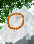 ORANGE AVENTURINE 6mm - HANDMADE CRYSTAL BRACELET - 6mm, bracelet, career, crystal bracelet, fertility, fire, handmade bracelet, jewelry, June 2025 inventory check, market bracelet, Orange, orange aventurine, Wearable - The Mineral Maven
