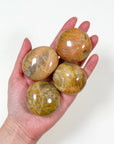 PEACH MOONSTONE PALM STONE - emotional support, fertility, moonstone, palm stone, peach moonstone, pebble, pocket crystal, pocket stone, recently added, solar eclipse, spring collection, spring equinox, spring things - The Mineral Maven