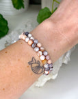 PINK BOTSWANA AGATE 6mm - HANDMADE CRYSTAL BRACELET - 6mm, agate, botswana agate, bracelet, clear/white, crystal bracelet, fire, gemini, grey, handmade bracelet, jewelry, June 2025 inventory check, mixed colors, pink, pink botswana agate, spring collection, Wearable - The Mineral Maven
