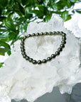 PYRITE 6mm - HANDMADE CRYSTAL BRACELET - 6mm, aries, bracelet, career, crystal bracelet, crystals for beginners, earth, fire, good luck + abundance, handmade bracelet, jewelry, June 2025 inventory check, leo, Leo szn, market bracelet, metallic, pyrite, Wearable - The Mineral Maven