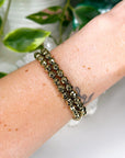 PYRITE (FACETED) 6mm - HANDMADE CRYSTAL BRACELET - 6mm, aries, bracelet, career, crystal bracelet, crystals for beginners, earth, faceted, fire, good luck + abundance, handmade bracelet, jewelry, June 2025 inventory check, leo, Leo szn, market bracelet, metallic, pyrite, Wearable - The Mineral Maven