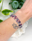 RAINBOW FLUORITE 6mm - HANDMADE CRYSTAL BRACELET - 6mm, august 2025 restock, bracelet, capricorn, crystal bracelet, crystals for beginners, fluorite, green, handmade bracelet, jewelry, libra, market bracelet, mercury rx, pisces, purple, Wearable - The Mineral Maven