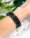 RAINBOW OBSIDIAN 10mm - HANDMADE CRYSTAL BRACELET - 10 Dec Inventory, 10mm, black, bracelet, bracelet inventory check, crystal bracelet, grief gift bundle, handmade bracelet, jewelry, June 2025 inventory check, market bracelet, obsidian, rainbow obsidian, scorpio, scorpio stack, solstice collection, virgo, virgo stack, Wearable, winter solstice collection - The Mineral Maven