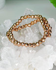 ROSE GOLD TITANIUM COATED HEMATITE (FACETED) 6mm - HANDMADE CRYSTAL BRACELET - 6mm, bracelet, crystal bracelet, faceted, handmade bracelet, hematite, jewelry, recently added, rose gold, titanium coated, valentines bracelets, valentines vibes, Wearable - The Mineral Maven