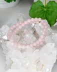 ROSE QUARTZ 6mm - HANDMADE CRYSTAL BRACELET - 6mm, aries, august 2025 restock, bracelet, cancer, capricorn, crystal bracelet, crystals for beginners, handmade bracelet, jewelry, June 2025 inventory check, libra, pink, pisces, rose quartz, spring collection, springtime, taurus, Wearable - The Mineral Maven