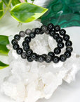 SILVER SHEEN OBSIDIAN 10mm - HANDMADE CRYSTAL BRACELET - 10 Dec Inventory, 10mm, black, bracelet, bracelet inventory check, crystal bracelet, Friday the 13th, handmade bracelet, jewelry, June 2025 inventory check, market bracelet, obsidian, protection gift bundle, Scorpio Season, silver sheen obsidian, Wearable - The Mineral Maven