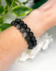 SILVER SHEEN OBSIDIAN 10mm - HANDMADE CRYSTAL BRACELET - 10 Dec Inventory, 10mm, black, bracelet, bracelet inventory check, crystal bracelet, Friday the 13th, handmade bracelet, jewelry, June 2025 inventory check, market bracelet, obsidian, protection gift bundle, Scorpio Season, silver sheen obsidian, Wearable - The Mineral Maven