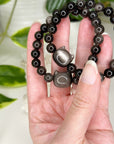 SILVER SHEEN OBSIDIAN CAT 8mm - HANDMADE CRYSTAL BRACELET - 10 Dec Inventory, 8mm, black, bracelet, cat, cat head, crystal bracelet, handmade bracelet, jewelry, June 2025 inventory check, kitty, memento mori, memento mori collection, moon, new critter drop, obsidian, Scorpio Season, silver sheen obsidian, Wearable - The Mineral Maven