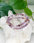 SUPER 7 6mm - HANDMADE CRYSTAL BRACELET - 6mm, 6th anniversary, bracelet, crystal bracelet, emotional support, handmade bracelet, jewelry, market bracelet, purple, Scorpio Season, super 7, Wearable - The Mineral Maven