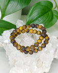 TIGER’S EYE (MATTE) 8mm - HANDMADE CRYSTAL BRACELET - 8mm, bracelet, capricorn, career, crystal bracelet, crystals for beginners, earth, fire, handmade bracelet, jewelry, Leo, market bracelet, matte, summerween collection, sun, tiger’s eye, Wearable - The Mineral Maven