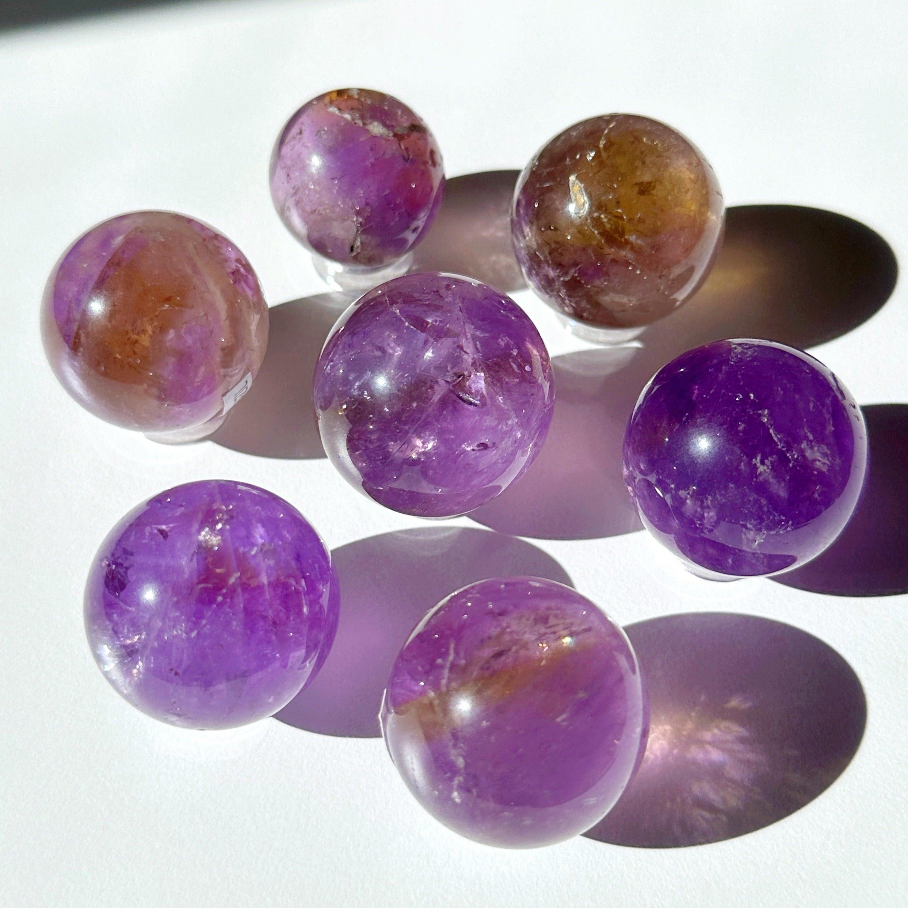 AMETRINE SPHERE - amethyst, ametrine, citrine, emotional support, february, focus gift bundle, grief gift bundle, mini sphere, polished, polished stone, recently added, sphere - The Mineral Maven