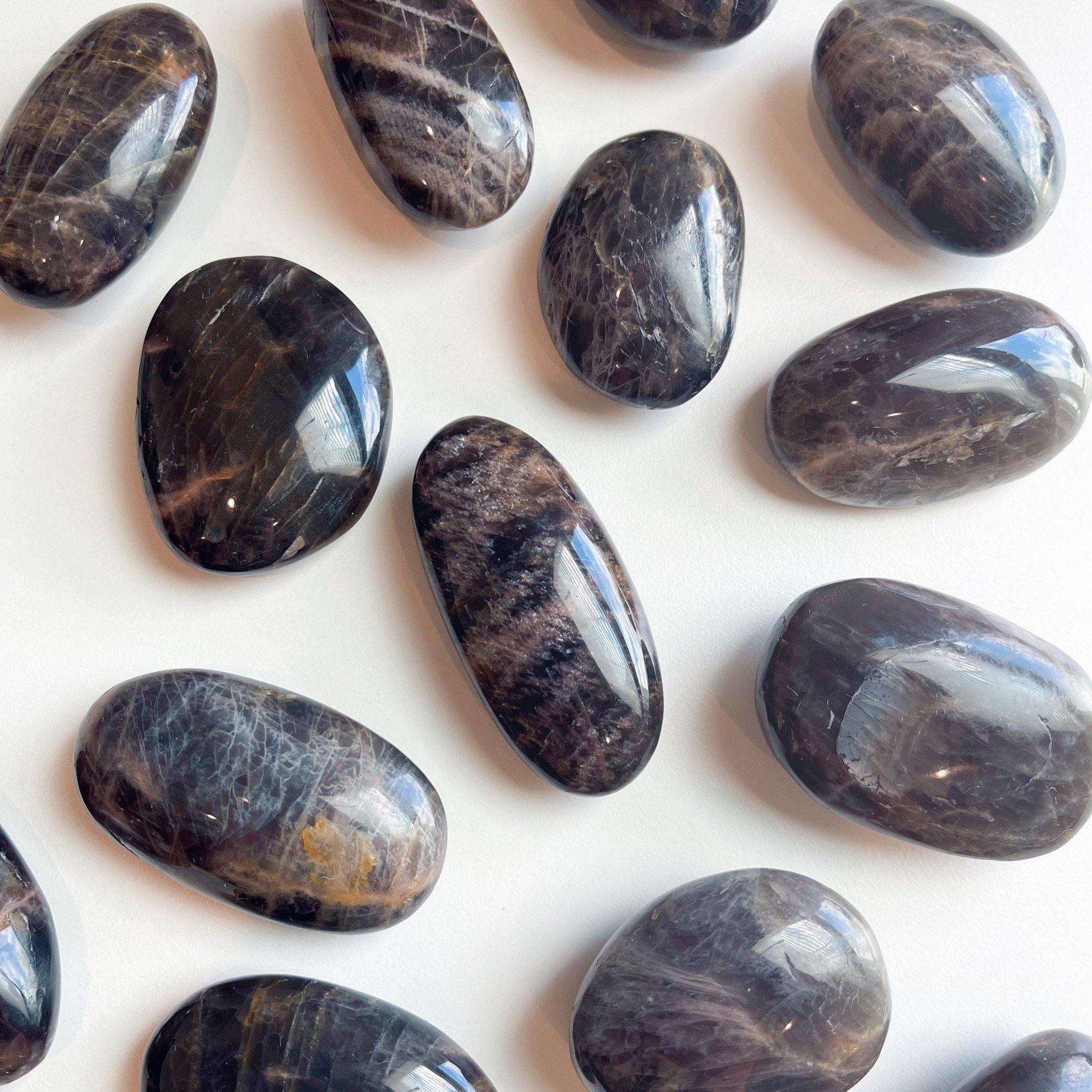 BLACK MOONSTONE PEBBLE - 2025 vibes, Black Friday sale, black moonstone, bulk, creativity, fertility, grounding, moonstone, new beginnings, new beginnings gift bundle, palm stone, pebble, pebbles, pocket crystal, protection, protection gift bundle, solar eclipse, spring equinox, spring things, taurus, taurus season, tumble - The Mineral Maven