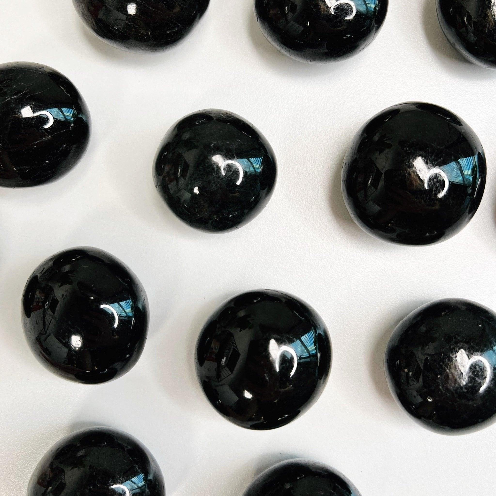 BLACK TOURMALINE PEBBLE - black tourmaline, emotional support, palm stone, palmstone, pebble, pebbles, pocket crystal, pocket stone, protection gift bundle, spring equinox, tourmaline, tucson update - The Mineral Maven