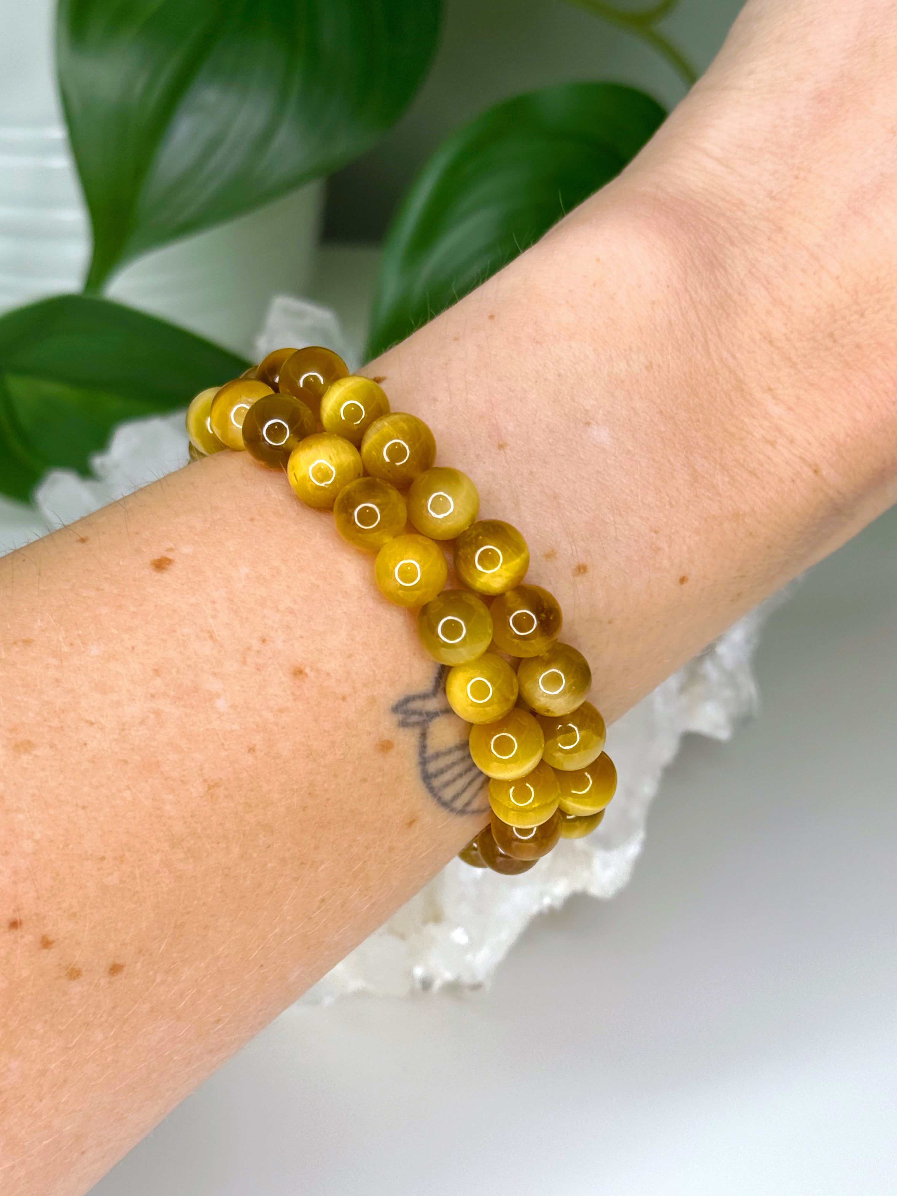 BLONDE TIGER’S EYE 8mm - HANDMADE CRYSTAL BRACELET - 8mm, blonde tigers eye, bracelet, capricorn, career, crystal bracelet, crystals for beginners, earth, fire, handmade bracelet, jewelry, Leo, market bracelet, summerween collection, sun, tiger’s eye, Wearable - The Mineral Maven