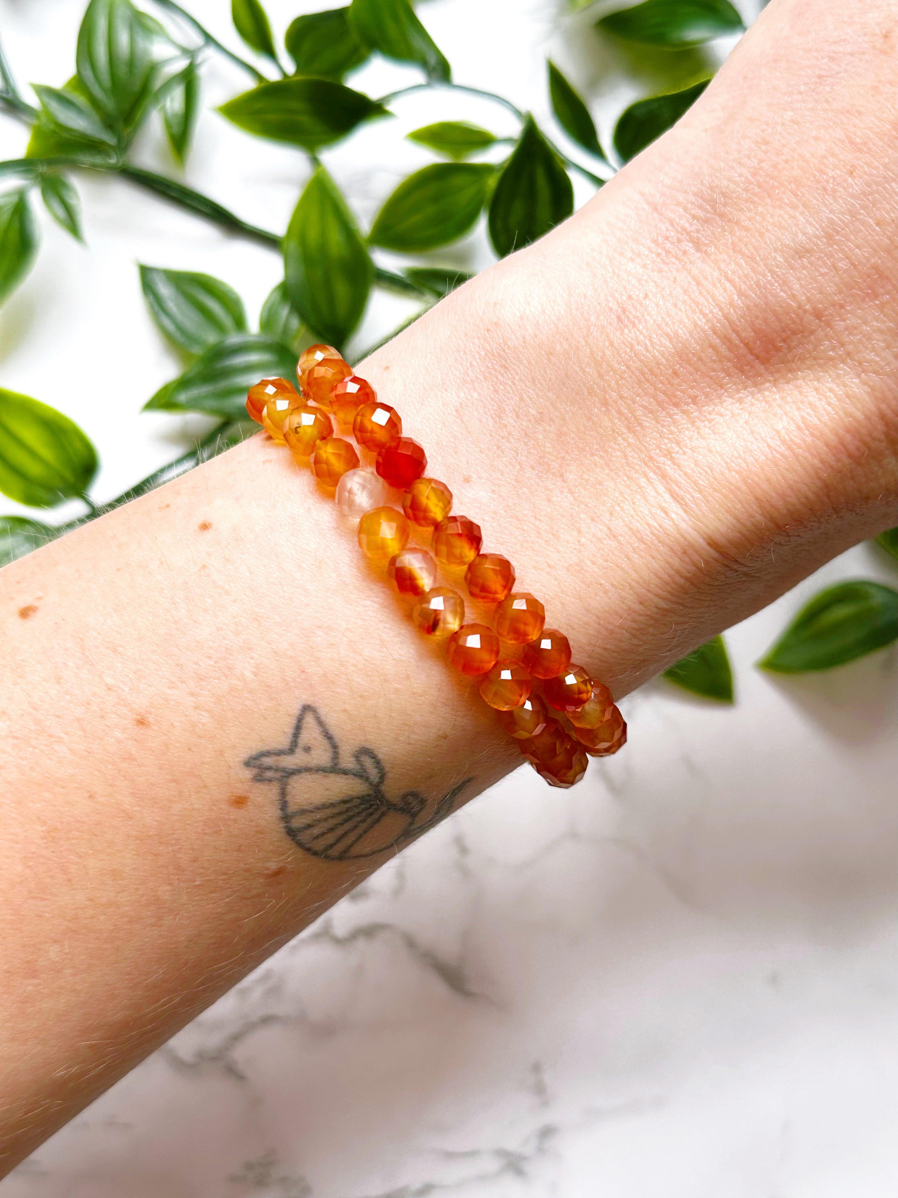 CARNELIAN (FACETED) 6mm - HANDMADE CRYSTAL BRACELET - 10 Dec Inventory, 6mm, bracelet, bracelet inventory check, cancer, cancer stack, career, carnelian, crystal bracelet, crystals for beginners, emotional support, faceted, fertility, fire, handmade bracelet, jewelry, June 2025 inventory check, june wrist candy, Leo, leo stack, Leo szn, market bracelet, orange, red, spring things, summer solstice, summer wrist candy, taurus, taurus stack, virgo, virgo stack, Wearable - The Mineral Maven