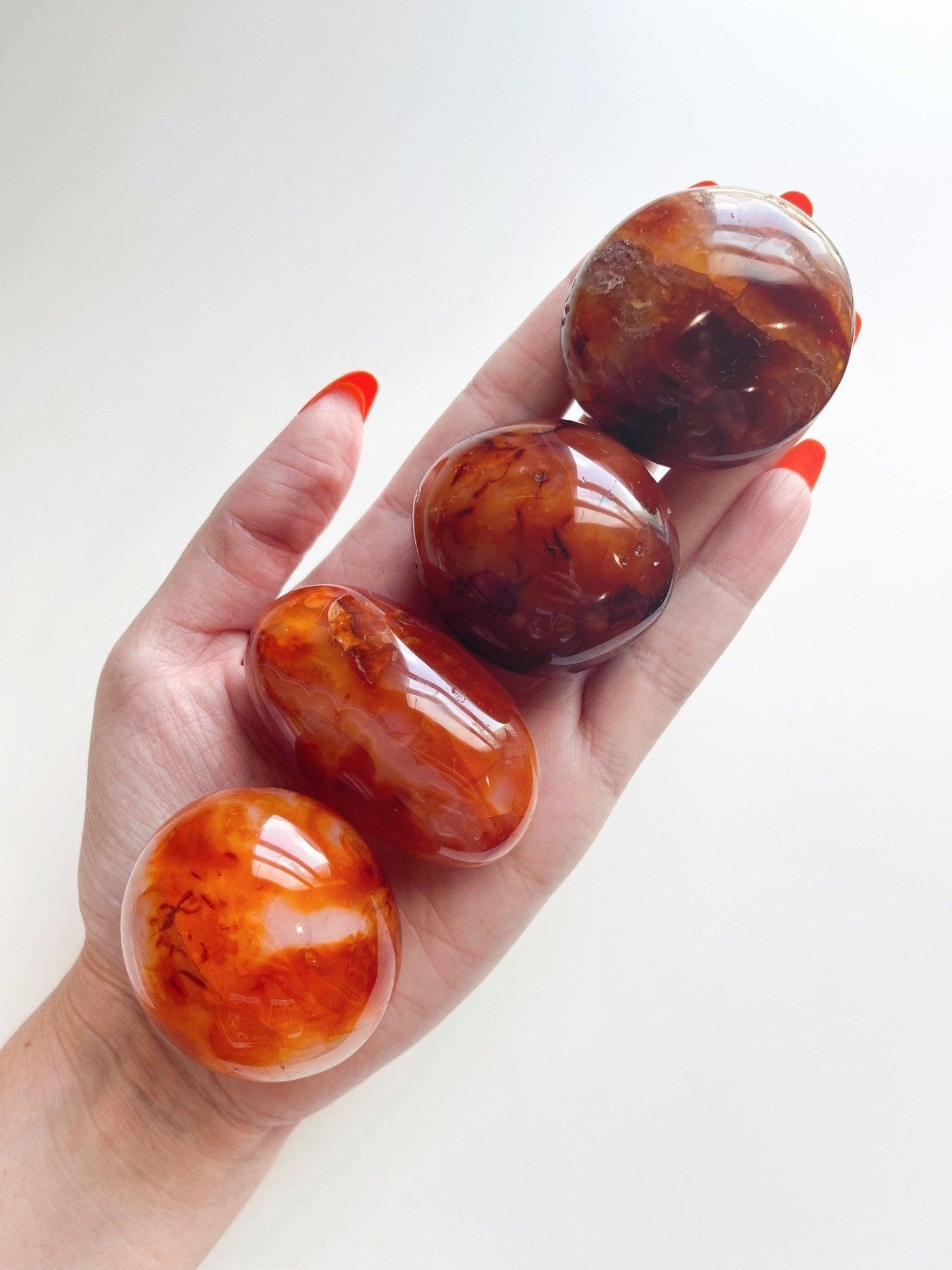 CARNELIAN PALM STONE - Black Friday sale, career, carnelian, crystals for beginners, emotional support, fertility, gallet, leo season, Leo szn, palm, palm stone, palmstone, spring equinox, spring things - The Mineral Maven
