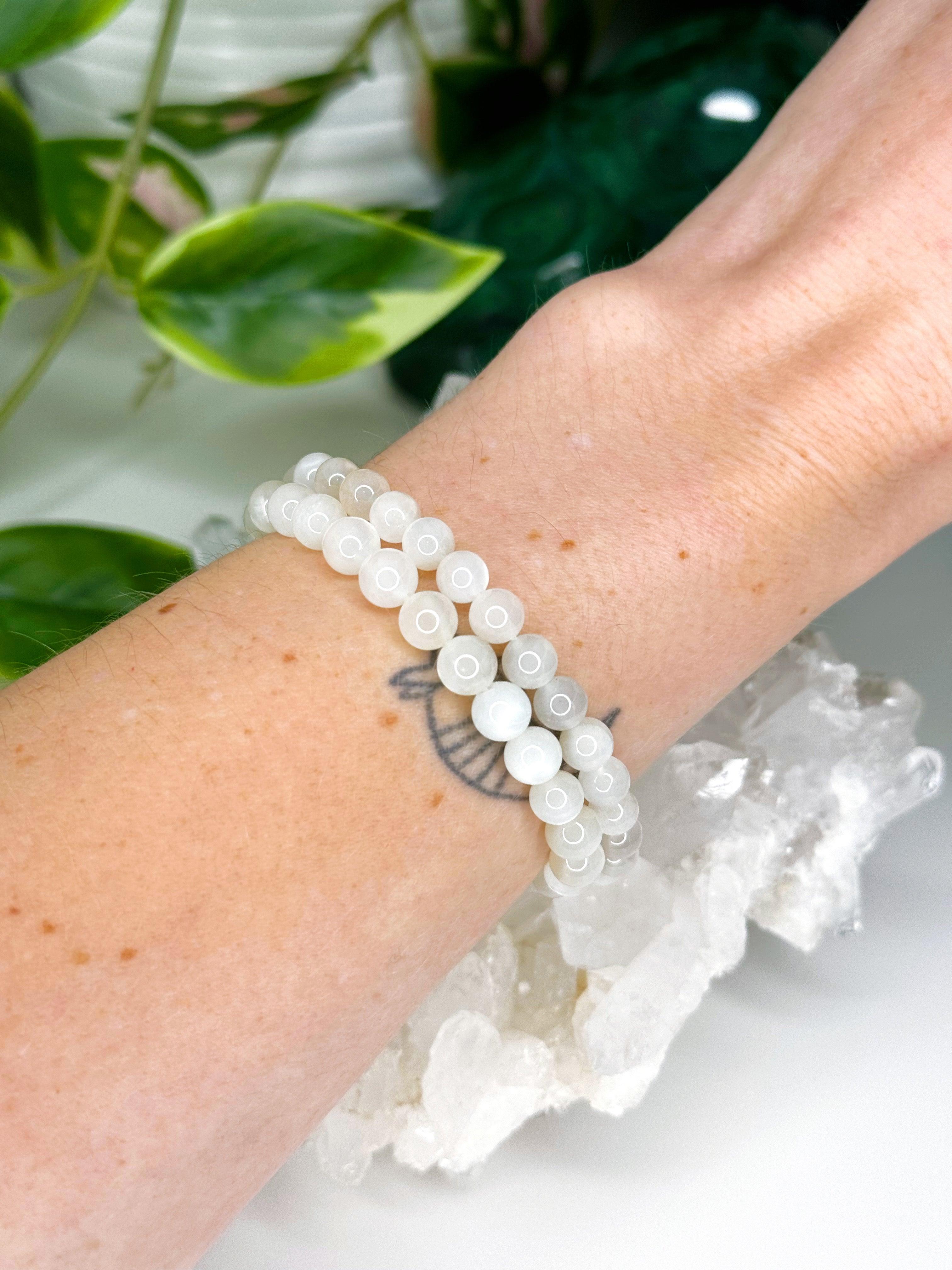 CHATOYANT WHITE MOONSTONE 6mm - HANDMADE CRYSTAL BRACELET - 6mm, air, april astro, aquarius, aquarius stack, bracelet, cancer, cancer stack, clear/white, crystal bracelet, emotional support, fertility, gemini, gemini stack, handmade bracelet, jewelry, joy gift bundle, libra, libra stack, market bracelet, may day/beltane, moonstone, new beginnings gift bundle, pisces, pisces stack, recently added, virgo, virgo stack, Wearable, winter collection, winter solstice collection - The Mineral Maven