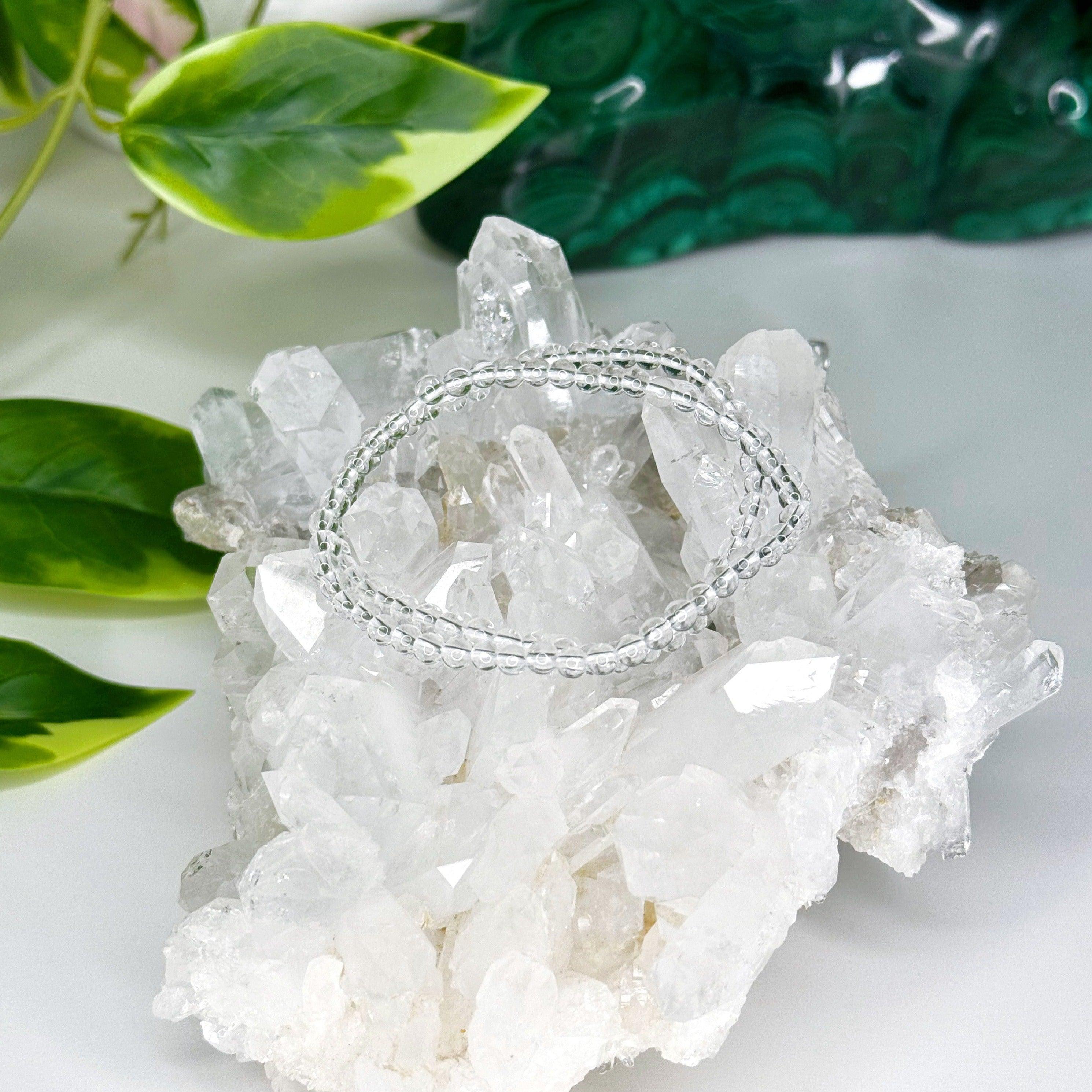 CLEAR QUARTZ 4mm - HANDMADE CRYSTAL BRACELET - 10 Dec Inventory, 6mm, air, bracelet, bracelet inventory check, cancer, clear quartz, clear/white, crystal bracelet, crystals for beginners, faceted, handmade bracelet, jewelry, June 2025 inventory check, leo, libra, market bracelet, mercury retrograde, quartz, sagittarius, storm, virgo, Wearable, winter collection, winter solstice, winter solstice collection - The Mineral Maven