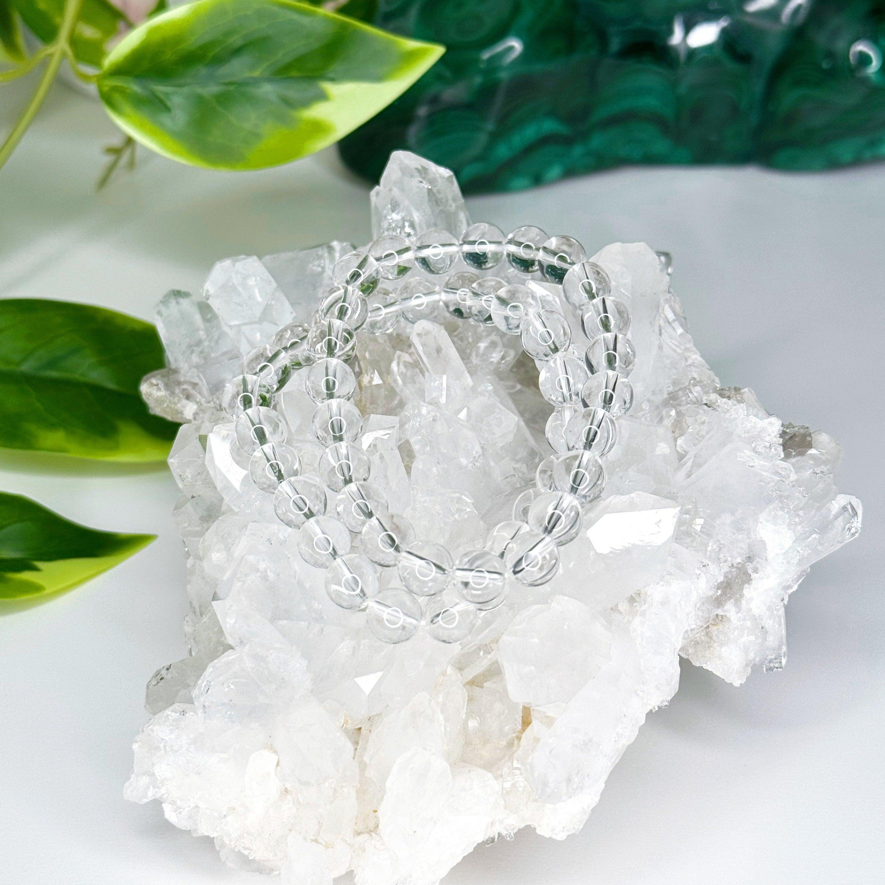 CLEAR QUARTZ 8mm - HANDMADE CRYSTAL BRACELET - 10 Dec Inventory, 8mm, air, bracelet, bracelet inventory check, cancer, clear quartz, clear/white, crystal bracelet, crystals for beginners, faceted, handmade bracelet, jewelry, June 2025 inventory check, leo, libra, market bracelet, mercury retrograde, quartz, sagittarius, storm, virgo, Wearable, winter collection, winter solstice, winter solstice collection - The Mineral Maven