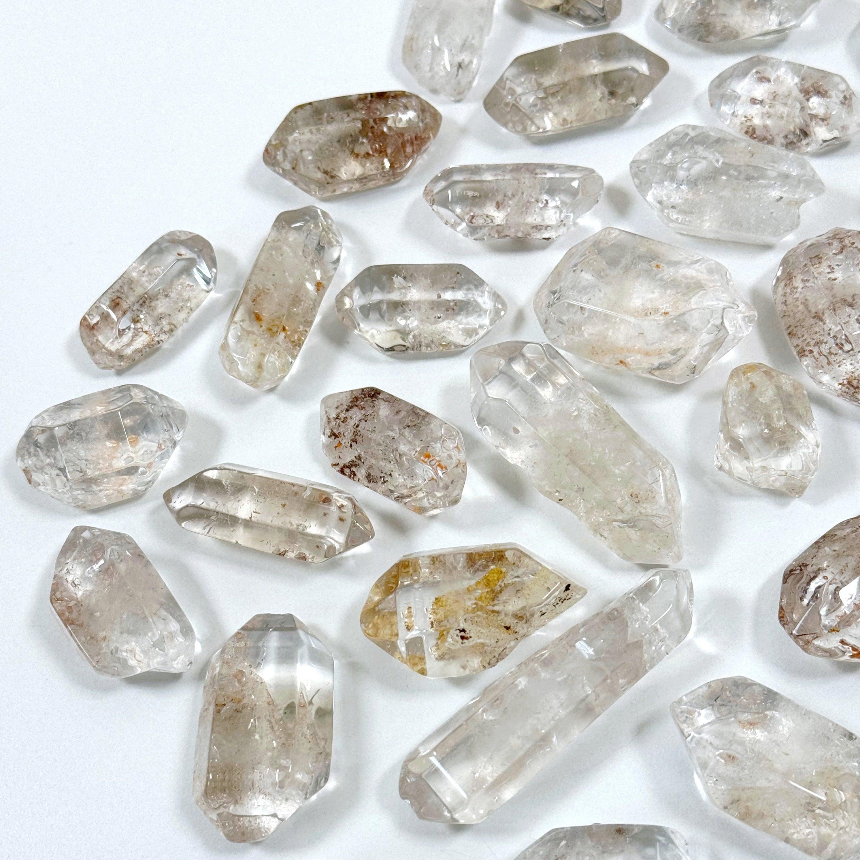 CLEAR QUARTZ POINT TUMBLE - clear quartz, crystals for community, pocket crystal, pocket crystals, pocket stone, quartz, recently added, tumble, tumbled, tumbled stone, tumbles - The Mineral Maven