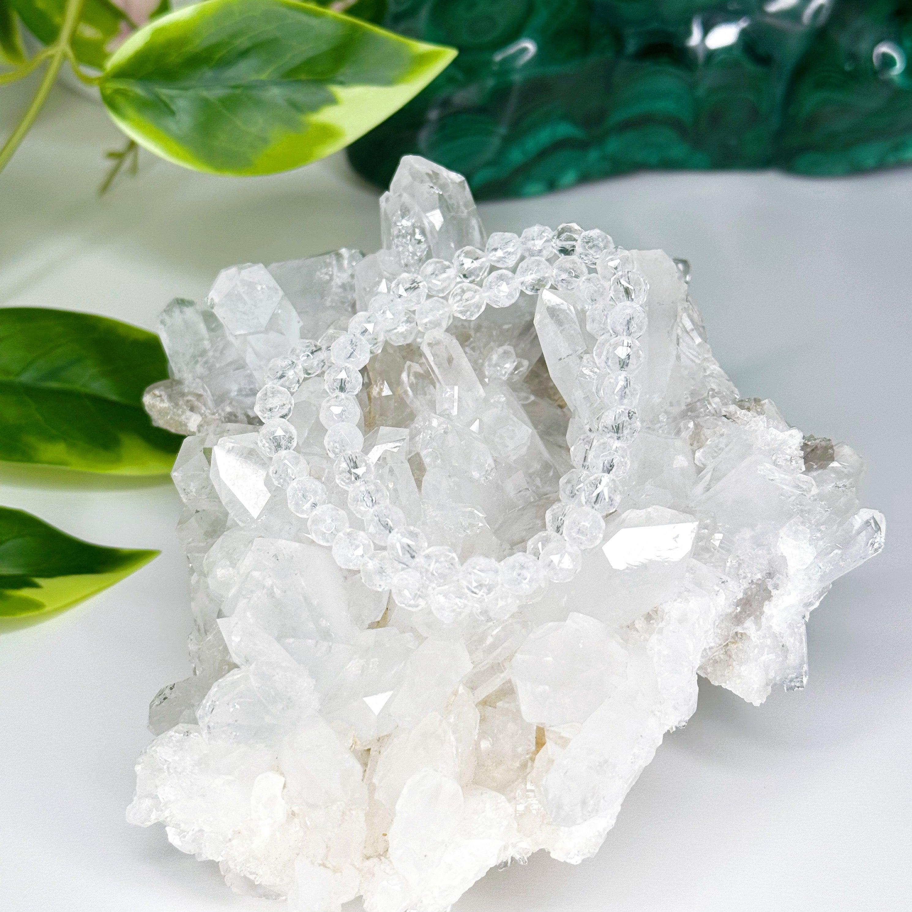 CLEAR QUARTZ (STAR CUT) 6mm - HANDMADE CRYSTAL BRACELET - 10 Dec Inventory, 6mm, air, bracelet, bracelet inventory check, cancer, clear quartz, clear/white, crystal bracelet, crystals for beginners, faceted, handmade bracelet, jewelry, June 2025 inventory check, leo, libra, market bracelet, mercury retrograde, quartz, rondelle, sagittarius, storm, virgo, Wearable, winter collection, winter solstice, winter solstice collection - The Mineral Maven