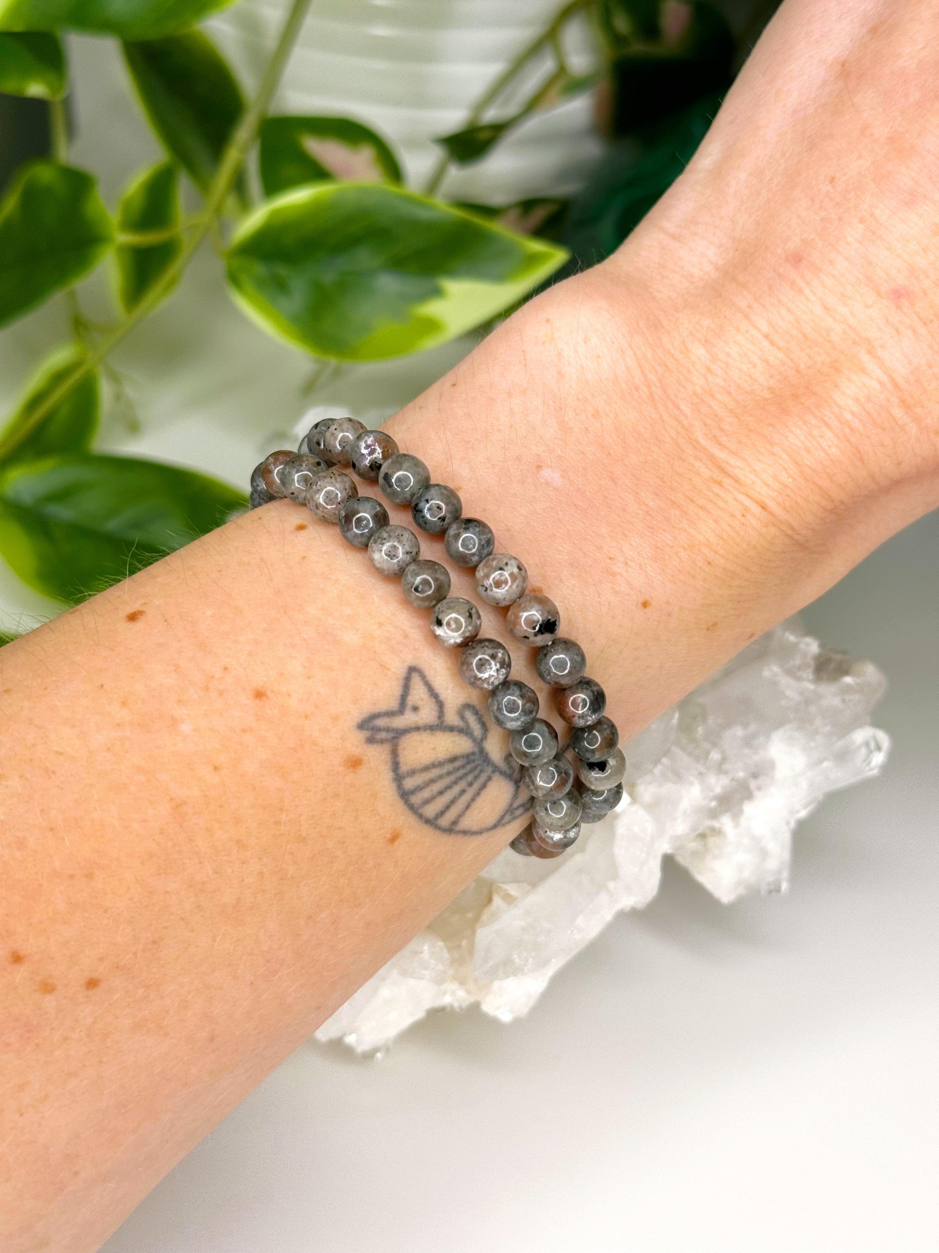 ‘FIRELITE’ 6mm (UV REACTIVE) - HANDMADE CRYSTAL BRACELET - 6mm, bracelet, calm gift bundle, crystal bracelet, emotional support, firelite, grey, handmade bracelet, jewelry, market bracelet, recently added, Scorpio Season, Wearable - The Mineral Maven