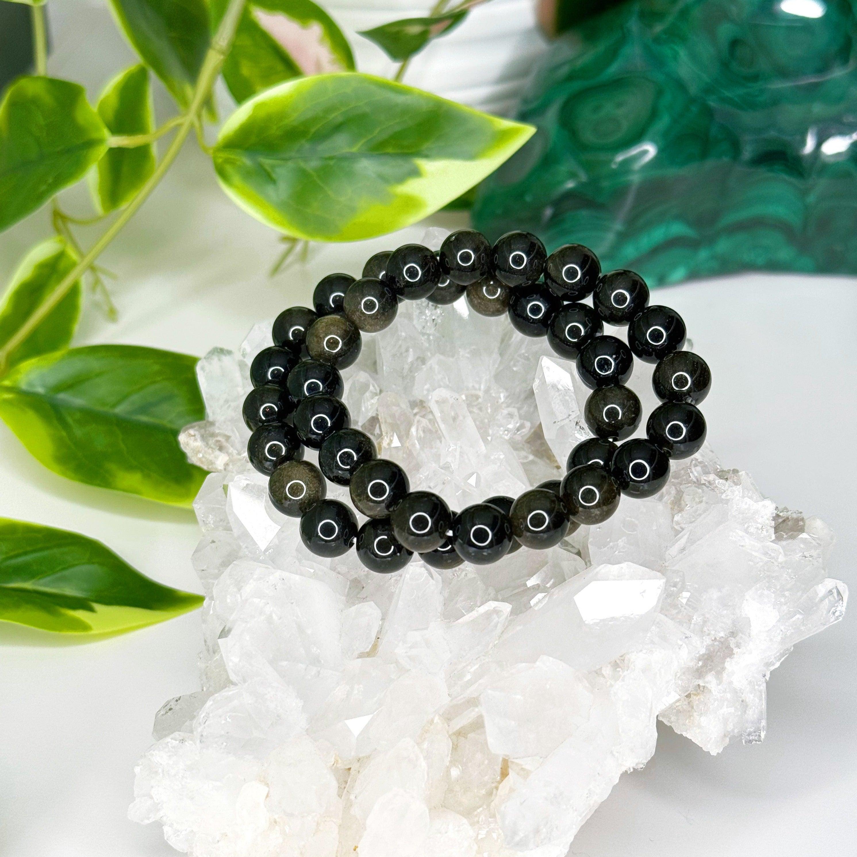 GOLD SHEEN OBSIDIAN 10mm - HANDMADE CRYSTAL BRACELET - 10 Dec Inventory, 10mm, april astro, black, bracelet, bracelet inventory check, crystal bracelet, Friday the 13th, gold sheen obsidian, handmade bracelet, jewelry, June 2025 inventory check, market bracelet, obsidian, scorpio, scorpio stack, virgo, virgo stack, Wearable - The Mineral Maven