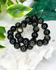 GOLD SHEEN OBSIDIAN 14mm - HANDMADE CRYSTAL BRACELET - 10 Dec Inventory, 14mm, black, bracelet, bracelet inventory check, crystal bracelet, Friday the 13th, gold sheen obsidian, handmade bracelet, jewelry, June 2025 inventory check, market bracelet, obsidian, scorpio, scorpio stack, virgo, virgo stack, Wearable - The Mineral Maven
