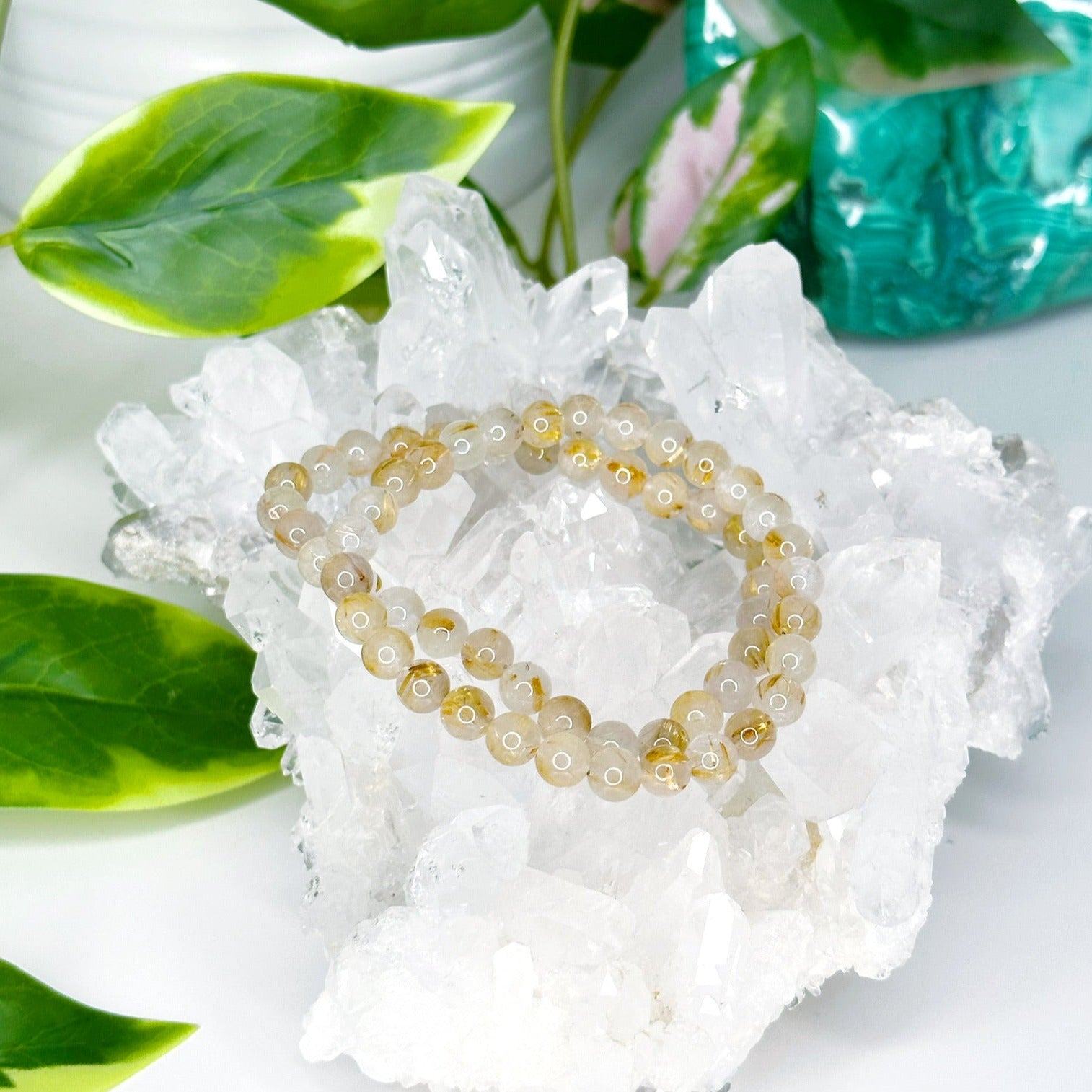 GOLDEN RUTILATED QUARTZ 6mm - HANDMADE CRYSTAL BRACELET - 10 Dec Inventory, 6mm, bracelet, bracelet inventory check, clear/white, crystal bracelet, emotional support, fall-o-ween, fall-o-ween bracelets, focus gift bundle, gemini, gemini stack, golden rutilated, golden rutilated quartz, handmade bracelet, jewelry, June 2025 inventory check, leo, leo stack, market bracelet, metallic, rutilated quartz, storm, Wearable, yellow - The Mineral Maven