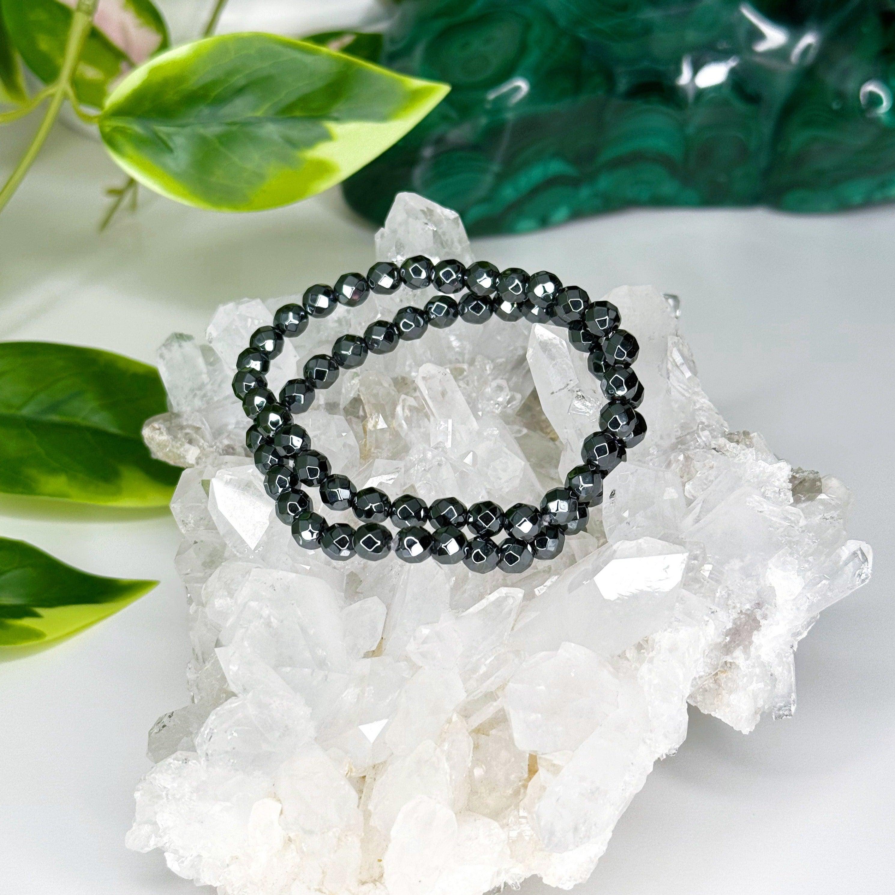 HEMATITE (FACETED) 6mm - HANDMADE CRYSTAL BRACELET - 6mm, Aquarius, aries, bracelet, crystal bracelet, earth, faceted, focus gift bundle, grey, handmade bracelet, hematite, jewelry, market bracelet, metallic, recently added, Scorpio Season, solstice collection, Wearable, winter solstice collection - The Mineral Maven