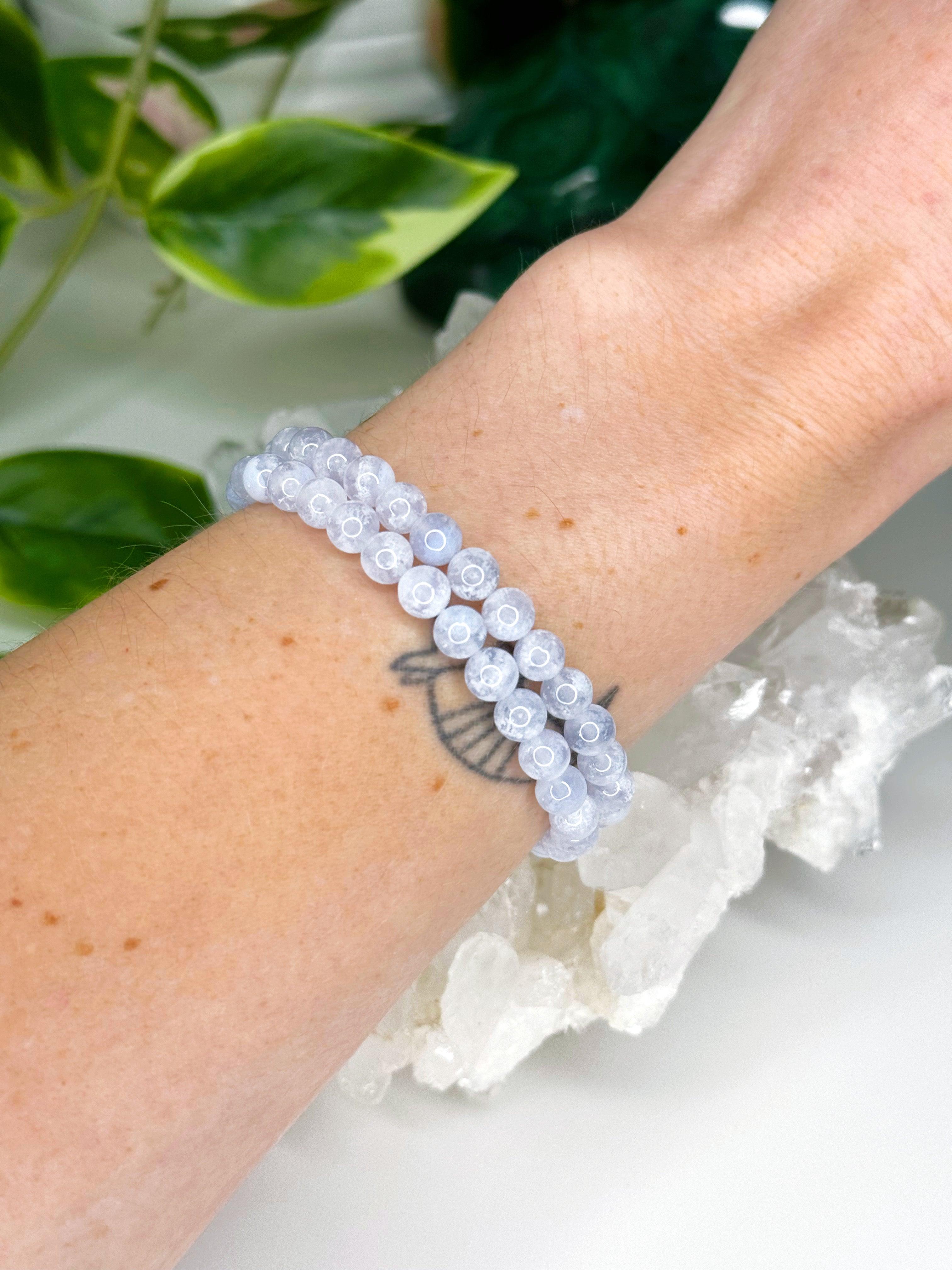 ICY BLUE LACE AGATE 6mm - HANDMADE CRYSTAL BRACELET - 6mm, air, blue, blue lace agate, bracelet, capricorn, capricorn stack, crystal bracelet, emotional support, gemini, gemini stack, handmade bracelet, icy, icy blue lace agate, jewelry, libra, libra stack, market bracelet, mercury retrograde, mercury retrograde stack, pisces, pisces stack, recently added, sagittarius, sagittarius stack, single bracelets, virgo, virgo stack, Wearable, winter collection, winter solstice collection - The Mineral Maven