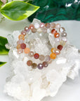 MOZAMBIQUE AGATE (FACETED) 8mm - HANDMADE CRYSTAL BRACELET - 8mm, agate, bracelet, crystal bracelet, emotional support, faceted, fire, gemini, gemini stack, handmade bracelet, jewelry, market bracelet, mixed colors, mozambique agate, recently added, solstice collection, Wearable, winter solstice collection - The Mineral Maven
