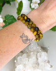 NELLITE 8mm - HANDMADE CRYSTAL BRACELET - 8mm, bracelet, bracelet inventory check, brown, crystal bracelet, crystals for beginners, handmade bracelet, jewelry, June 2025 inventory check, leo, market bracelet, nellite, pietersite, sagittarius, tigers eye, tucson mini drop, Wearable - The Mineral Maven