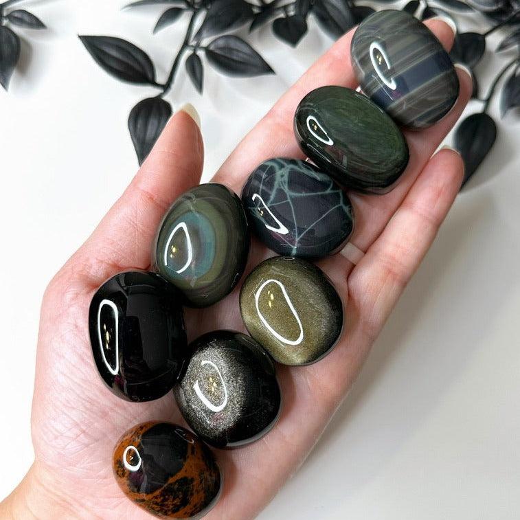 OBSIDIAN POCKET PEBBLE - Black Friday sale, black obsidian, emotional support, end of year sale, Friday the 13th, gold obsidian, gold sheen obsidian, grief gift bundle, holiday sale, mahogany obsidian, mercury rx, obsidian, palm stone, pebble, platinum obsidian, pocket crystal, pocket stone, protection gift bundle, rainbow obsidian, silver sheen obsidian, spiderweb obsidian, tumble, tumbled, tumbled stone, velvet obsidian - The Mineral Maven